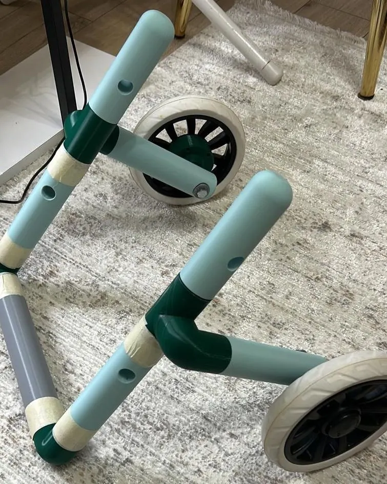 Two-wheeled support frame for a paralyzed pet